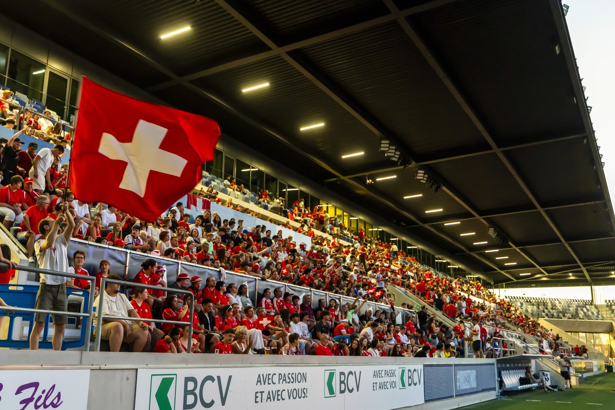 epa13096521 A general view during a public viewing of the FIFA 2026 World Cup round of 16 soccer match between Switzerland and Colombia, at the fan zone inside of the stade de la Tuiliere, in Lausanne ...