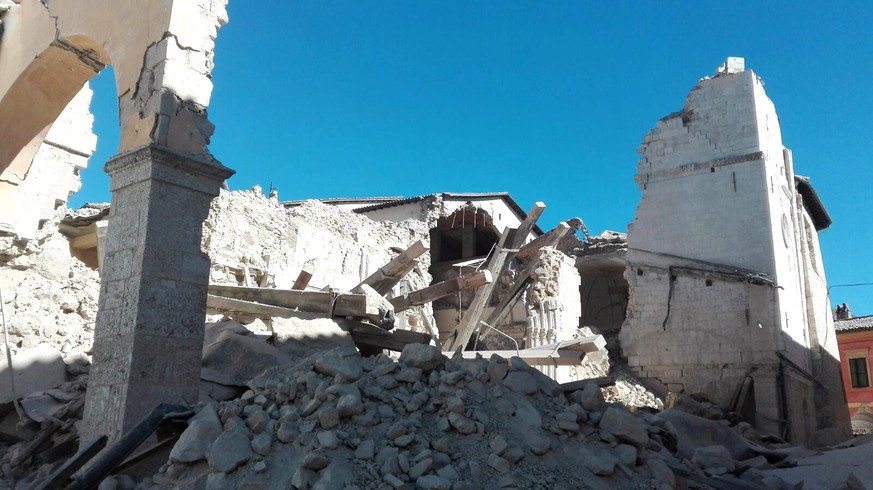 epa05609898 The Basilica of San Benedetto destroyed after the strong earthquake in central Italy, Norcia, Umbria Region, 30 October 2016. A 6.6 magnitude earthquake struck 6km north of Norcia, Italy,  ...