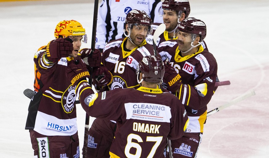 Geneve-Servette&#039;s defender Henrik Toemmernes, of Sweden, left, celebrates his goal with teammates center Eric Fehr #16, of Canada, forward Linus Omark #67, of Sweden, forward Arnaud Montandon #70 ...