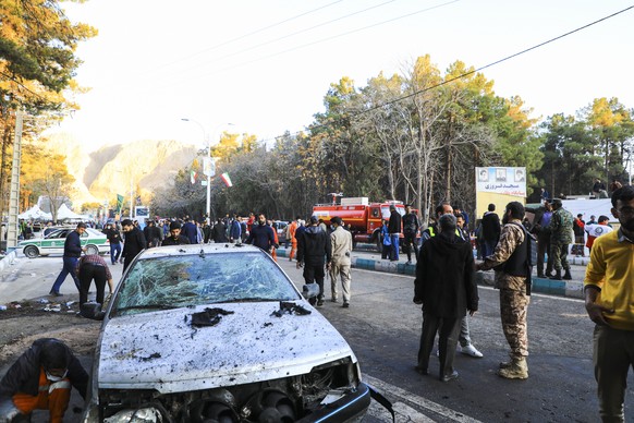 epa11055690 Damaged vehicles after explosions at a commemoration ceremony next to the tomb of Iran&#039;s Revolutionary Guards chief of foreign operations Iranian General Qasem Soleimani in the Saheb  ...