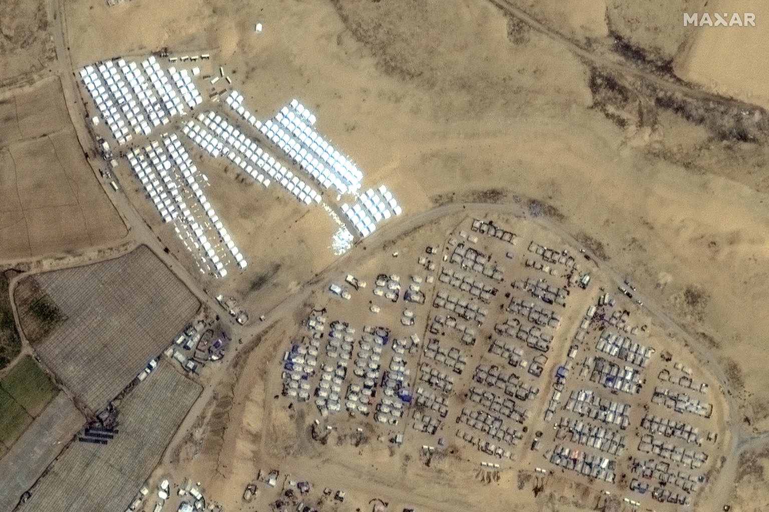 This image provided by Maxar Technologies, shows a rows of tents built near Rafah in Gaza on April 23, 2024. (Satellite image �2024 Maxar Technologies via AP)