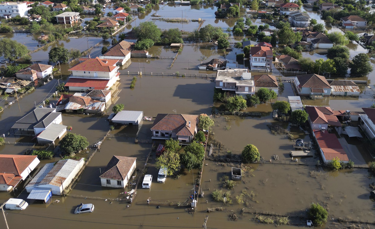 Floodwaters and mud covers the town of Palamas, after the country&#039;s rainstorm record, in Karditsa, Thessaly region, central Greece, Friday, Sept. 8, 2023. Rescue crews in helicopters and boats ar ...