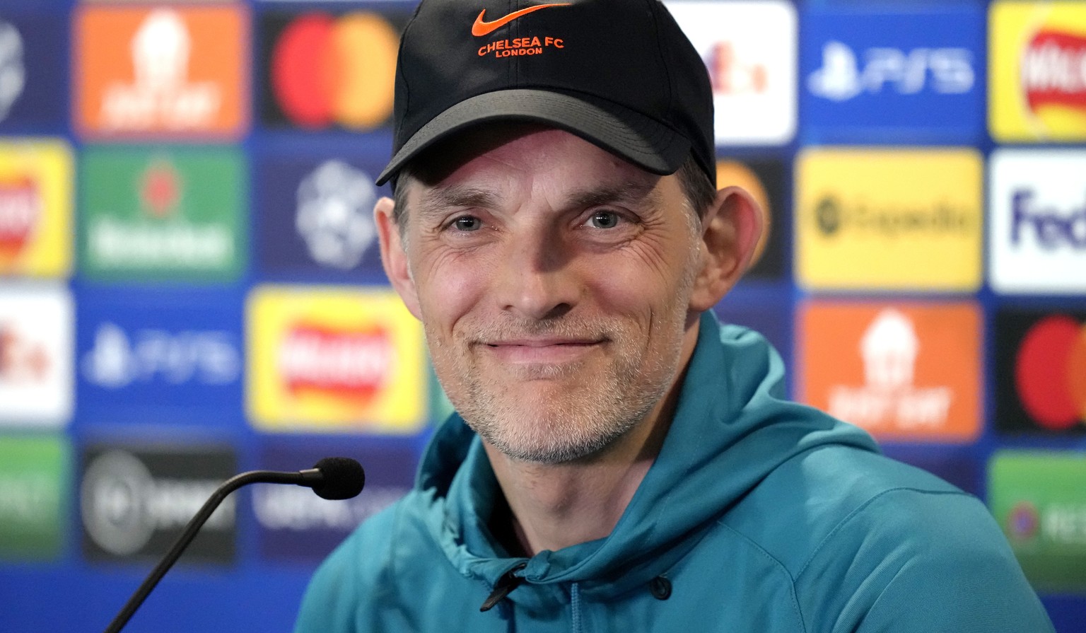 Chelsea&#039;s head coach Thomas Tuchel smiles during a press conference ahead of Wednesday&#039;s Champions League first-leg quarterfinal soccer match between Chelsea and Real Madrid at Stamford Brid ...