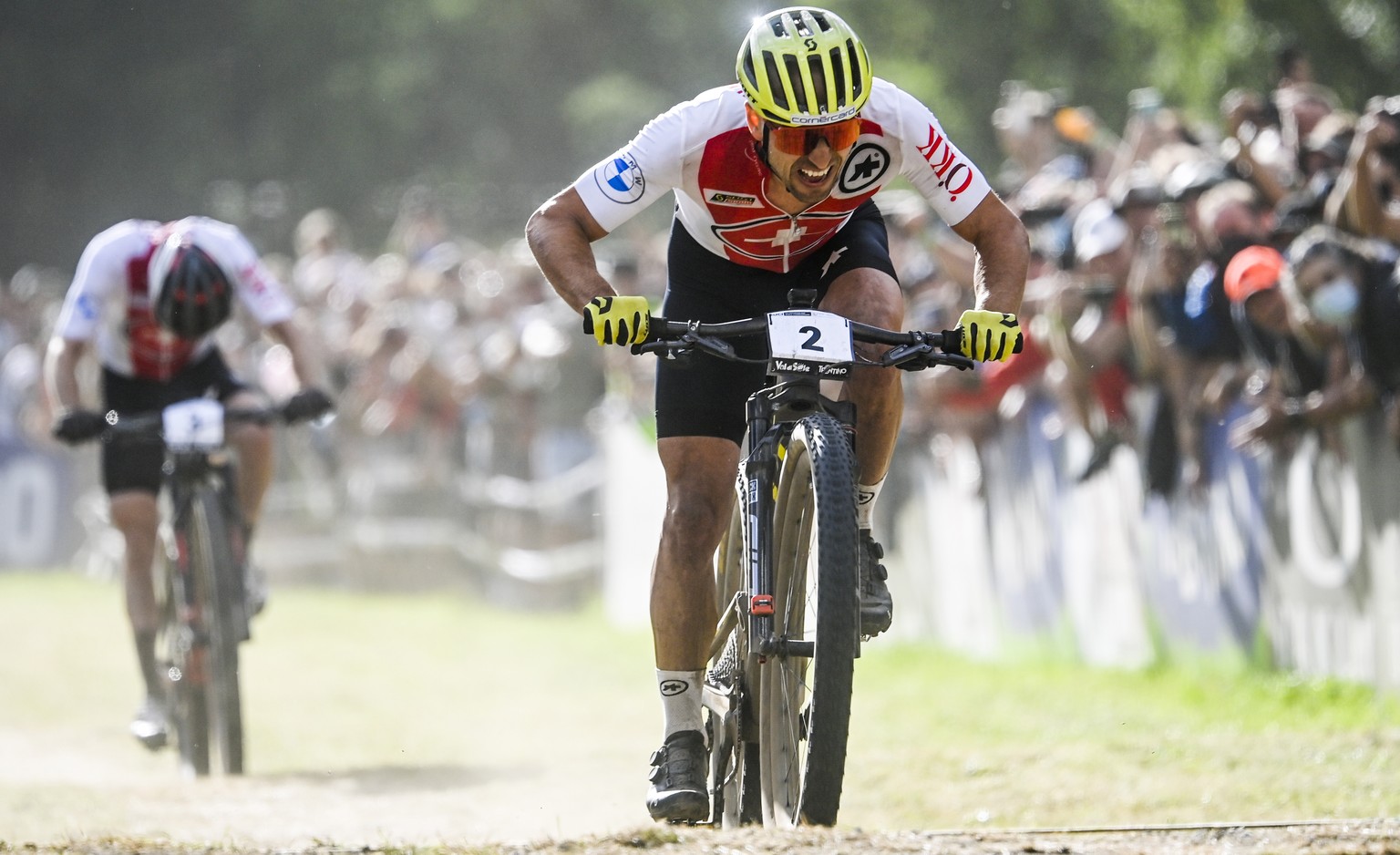 epa09434001 Nino Schurter (R) of Switzerland takes the win in front of Mathias Flueckiger of Switzerland during the Men&#039;s Elite Cross-Country Olympic&#039;s race at the UCI Mountain Bike World Ch ...