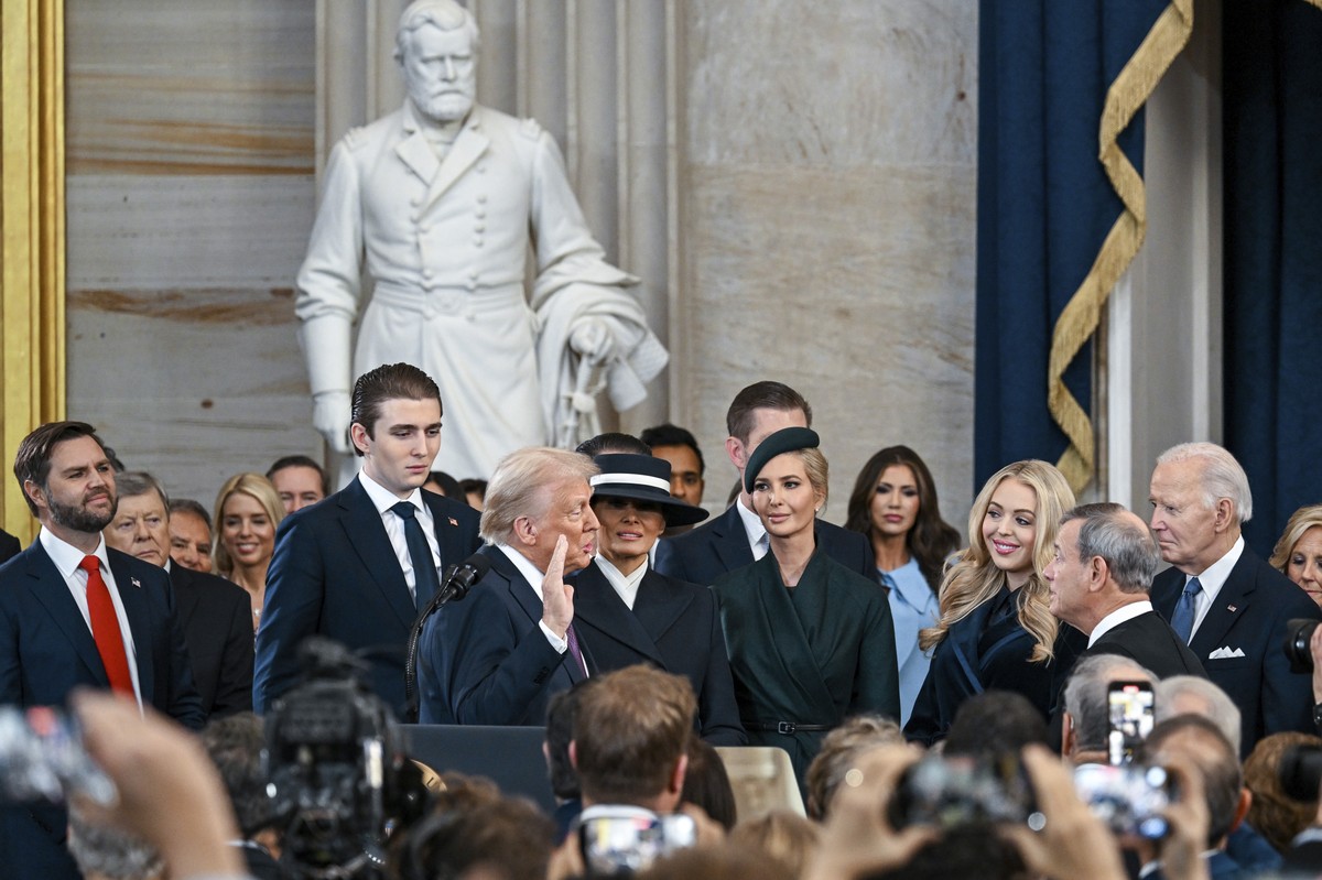 President-elect Donald Trump, center left, is sworn in by Chief Justice John Roberts, second right, as Vice President JD Vance, from left, Barron Trump, Melania Trump, Ivanka Trump, Tiffany Trump and  ...