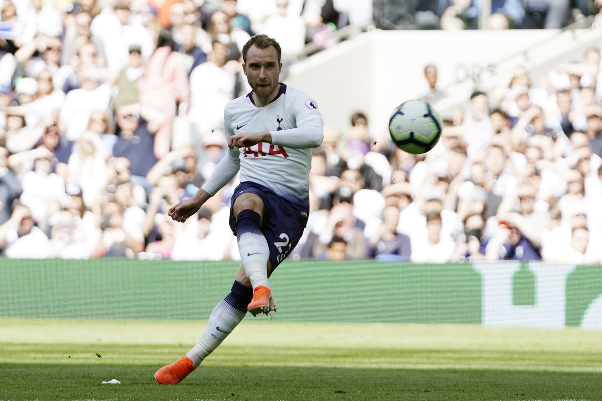 epa07565010 Tottenham's Christian Eriksen scores during the English Premier League soccer match between Tottenham and Everton at the Tottenham Hotspur Stadium, Central London, Britain, 12 May 201 ...