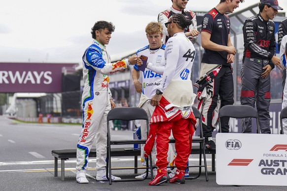 FORMULA ONE AUSTRALIAN GRAND PRIX 2026 Lewis Hamilton 44GBR Ferrari, Arvid Lindblad 41 GBR Racing Bulls and Liam Lawson 30 NZL Racing Bulls taking part in a photoshoot during the Formula 1 Qatar Airwa ...