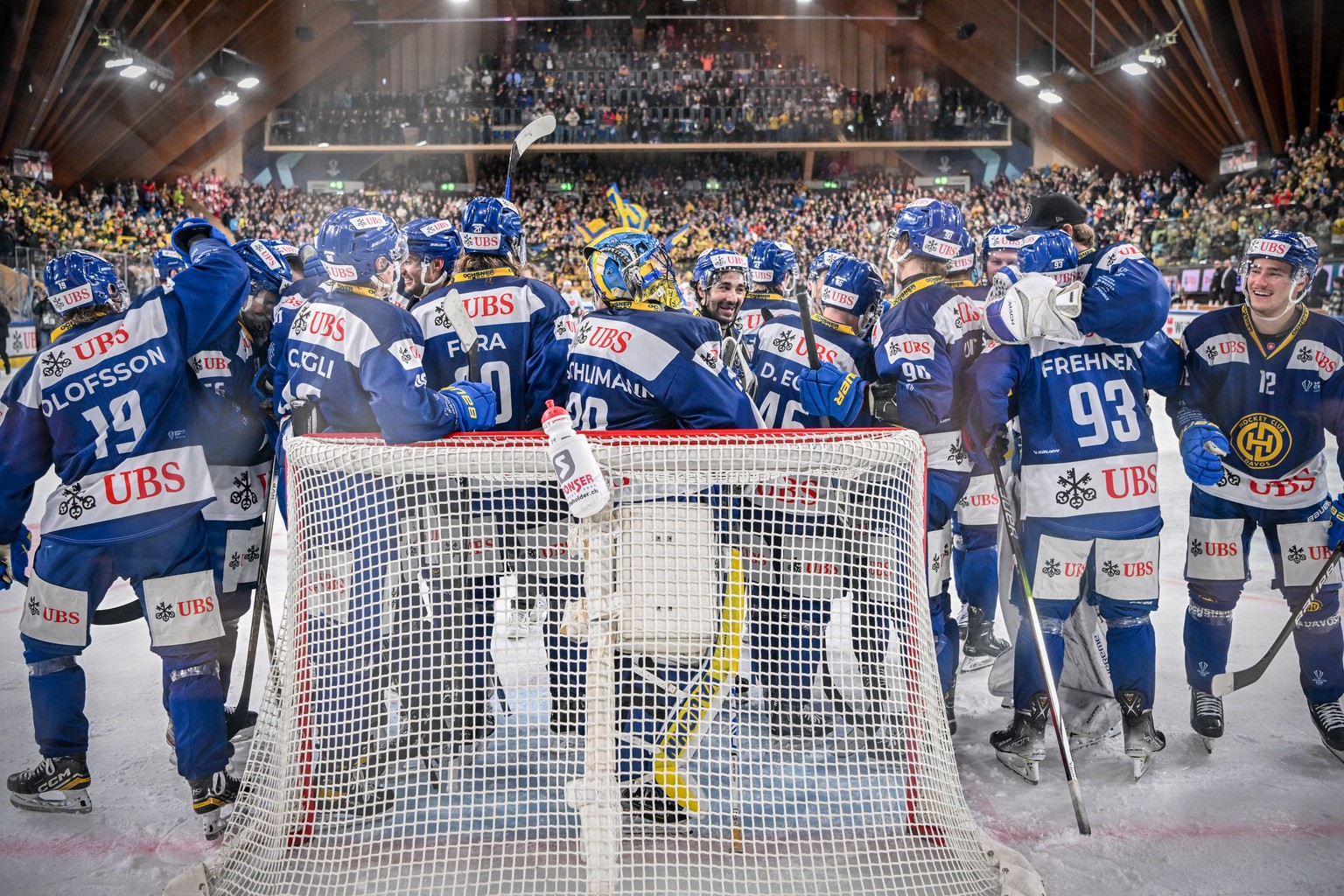 Davos&#039; players celebrate after winning the final game between Switzerland&#039;s HC Davos and HC Dynamo Pardubice, at the 95th Spengler Cup ice hockey tournament in Davos, Switzerland, on Sunday, ...