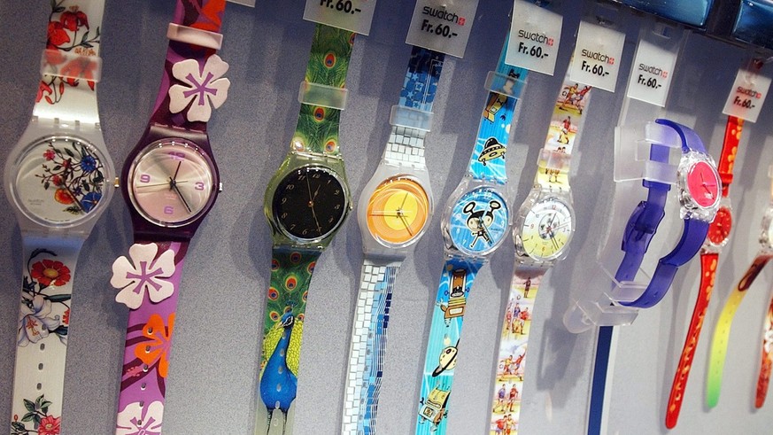 epa04056386 (FILE) A file photo dated 21 August 2002 showing Swatch watches at a company store in central Zurich, Switzerland. Swatch, the worlds biggest watchmaker, reports 05 February 2014 it increa ...