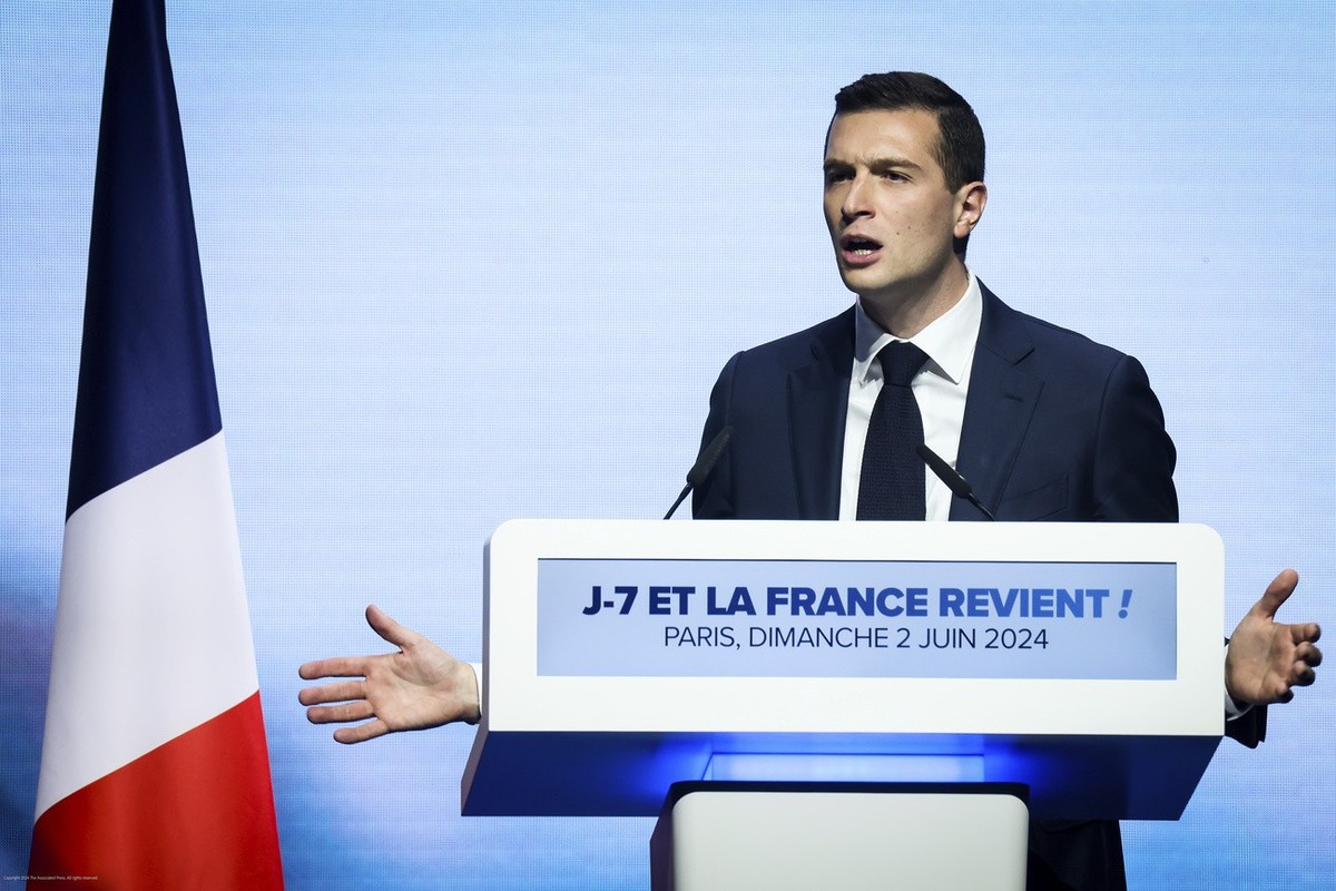 Lead candidate of the French far right National Rally Jordan Bardella for the upcoming European elections speaks during a political meeting on Sunday, June 2, 2024 in Paris. (AP Photo/Thomas Padilla)
