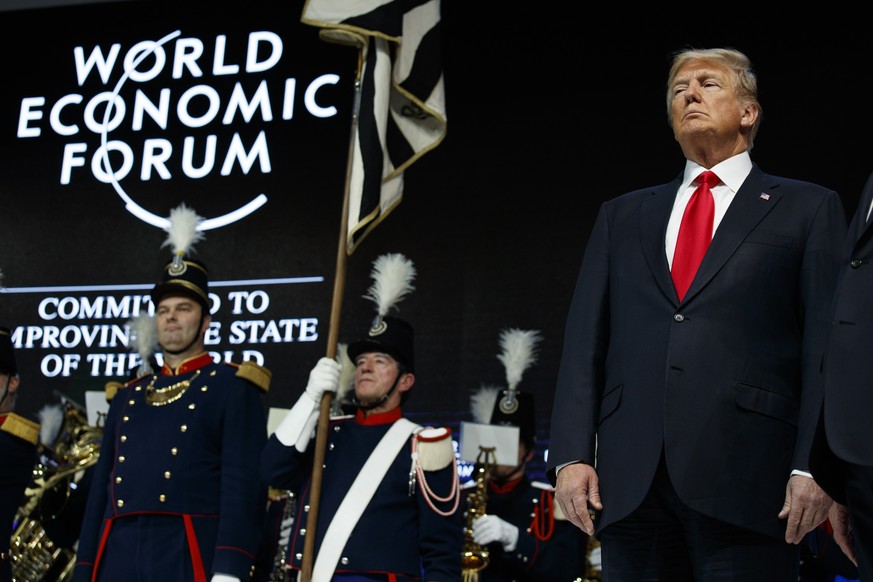 President Donald Trump stands before delivering a speech to the World Economic Forum, Friday, Jan. 26, 2018, in Davos. (AP Photo/Evan Vucci)