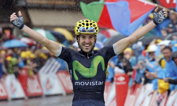 Cycling - Tour de France cycling race - The 146.5-km (91.5 miles) Stage 20 from Megeve to Morzine, France - 23/07/2016 - Movistar Team rider Jon Izaguirre Insausti of Spain wins on the finish line. RE ...