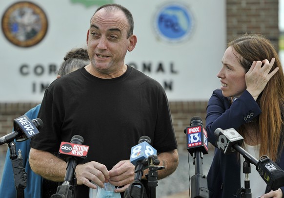 Former inmate Robert DuBoise, 56, and Innocent Project Staff Attorney Susan Friedman meet reporters outside the Hardee County Correctional Institute after serving 37 years in prison, when officials di ...