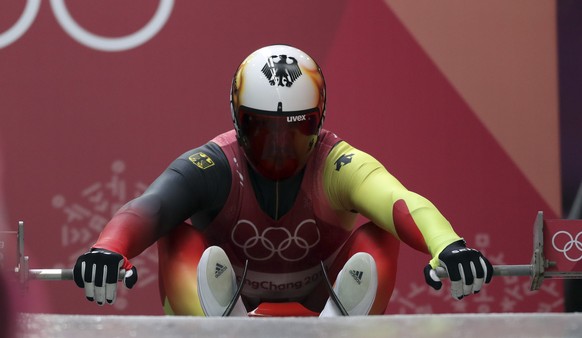 Felix Loch of Germany starts his third run during final heats of the men&#039;s luge competition at the 2018 Winter Olympics in Pyeongchang, South Korea, Sunday, Feb. 11, 2018. (AP Photo/Michael Sohn)