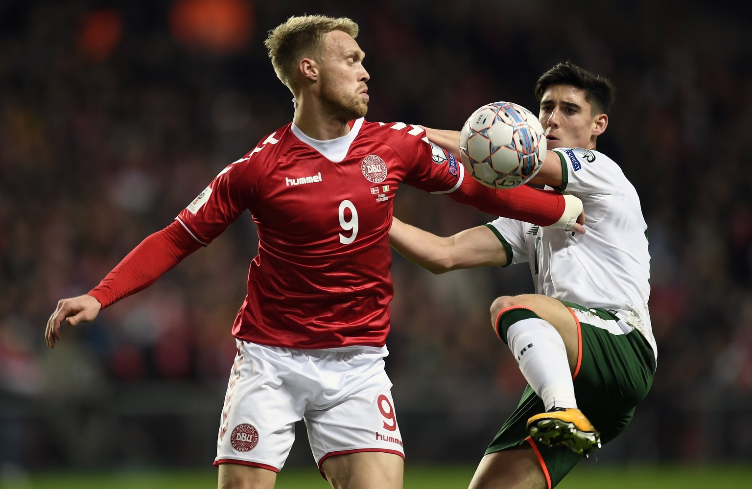 epa06323353 Nicolai Joergensen (L) of Denmarkin action against Callum O&#039;Dowda of Ireland during the FIFA World Cup 2018 play-off first leg soccer match between Denmark and Ireland in Copenhagen,  ...