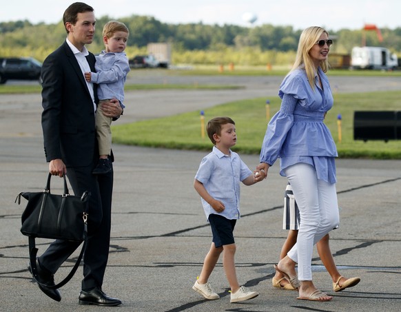 White House senior adviser Jared Kushner, left, his wife Ivanka Trump, the daughter of President Donald Trump, fourth from left, and their children, Theodore, second from left, Joseph, third from left ...