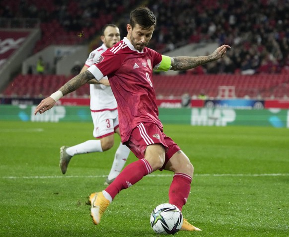 Russia&#039;s Fyodor Smolov kicks the balll during the World Cup 2022 group H qualifying soccer match between Russia and Malta at the Otkrytie Arena in Moscow, Russia, Tuesday, Sept. 7, 2021. (AP Phot ...