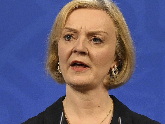 Britain&#039;s Prime Minister Liz Truss attends a press conference in the Downing Street Briefing Room in central London, Friday Oct. 14, 2022, following the sacking of the finance minister in respons ...