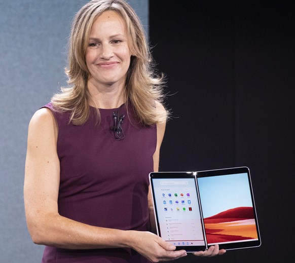 Microsoft Program Manager Carmen Zlateff discusses the Surface Neo during a Microsoft event, Wednesday, Oct. 2, 2019, in New York. (AP Photo/Mark Lennihan)