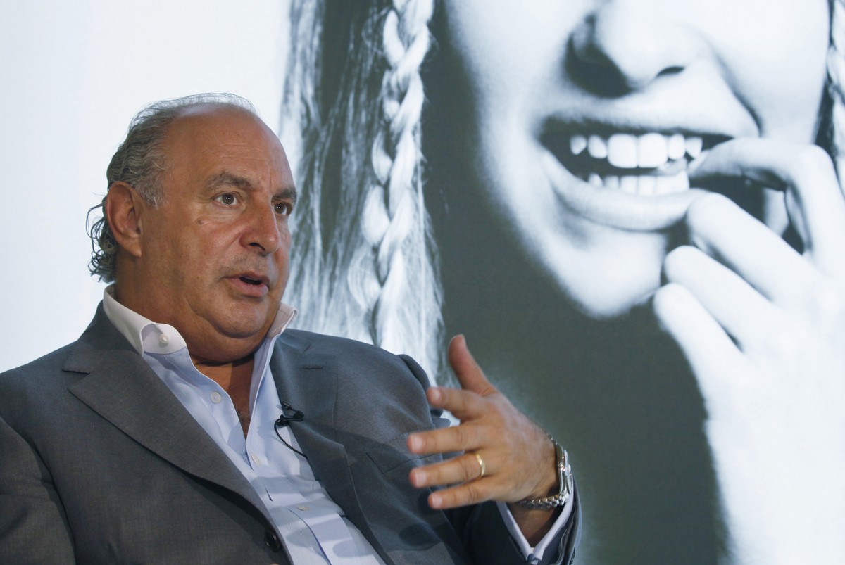 FILE - In this file photo dated Wednesday, June 5, 2013, Philip Green speaks during an interview at his new Topshop store in Hong Kong. British politician Peter Hain has used British Parliament's ...