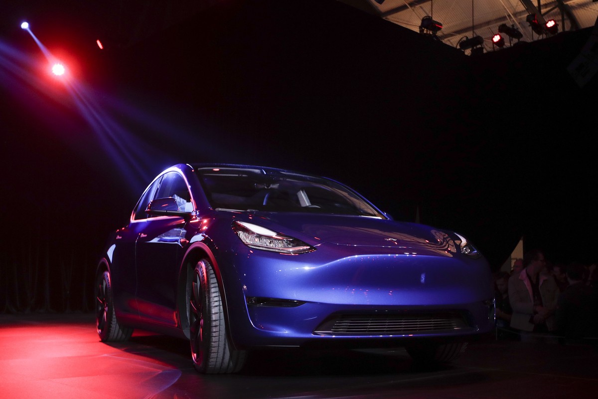 FILE - In this March 14, 2019, file photo the Tesla Model Y is unveiled at Tesla's design studio in Hawthorne, Calif. A Delaware judge is weighing whether to dismiss Tesla shareholders' comp ...