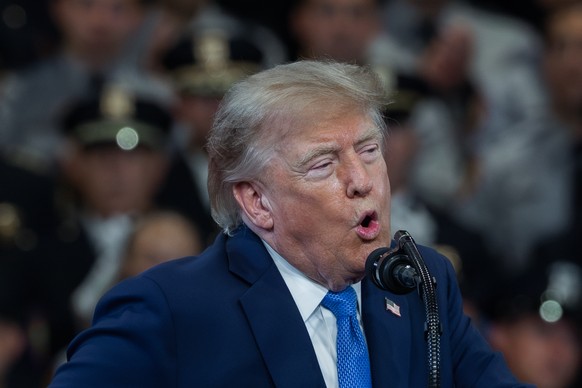 epa13170149 US President Donald Trump gives a speech on crime reduction and public safety at the Nassau County Police Academy in Garden City, Nassau County, on Long Island, New York, USA, 14 August 20 ...