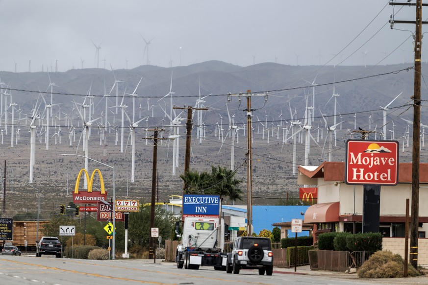 epa12530433 Wind turbines in the distance are seen at the Mojave Wind Farm in Mojave, California, USA, 16 November 2025. The Mojave Wind Farm in Kern County, California, is one of the largest and most ...