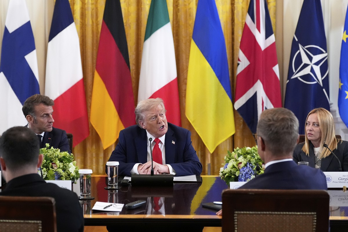 President Donald Trump speaks as France's President Emmanuel Macron, left, and Italy's Prime Minister Giorgia Meloni, right, listen during a meeting with Ukrainian President Volodymyr Zelens ...