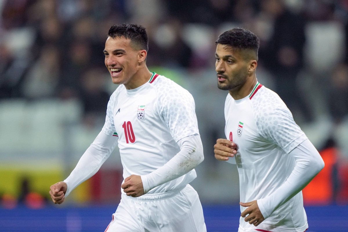 Russia Soccer Friendly Russia - Iran 9023675 10.10.2025 Iran s Amirhossein Hosseinzadeh celebrates with teammate Mohammad Mohebi after scoring his team s first goal during the friendly soccer match be ...