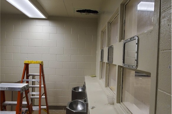 This photo provided Monday, Nov. 4, 2019, by the Monterey County Sheriff&#039;s Office shows a hole cut into the ceiling and the area that Santos Fonseca and Jonathan Salazar escaped from in the count ...