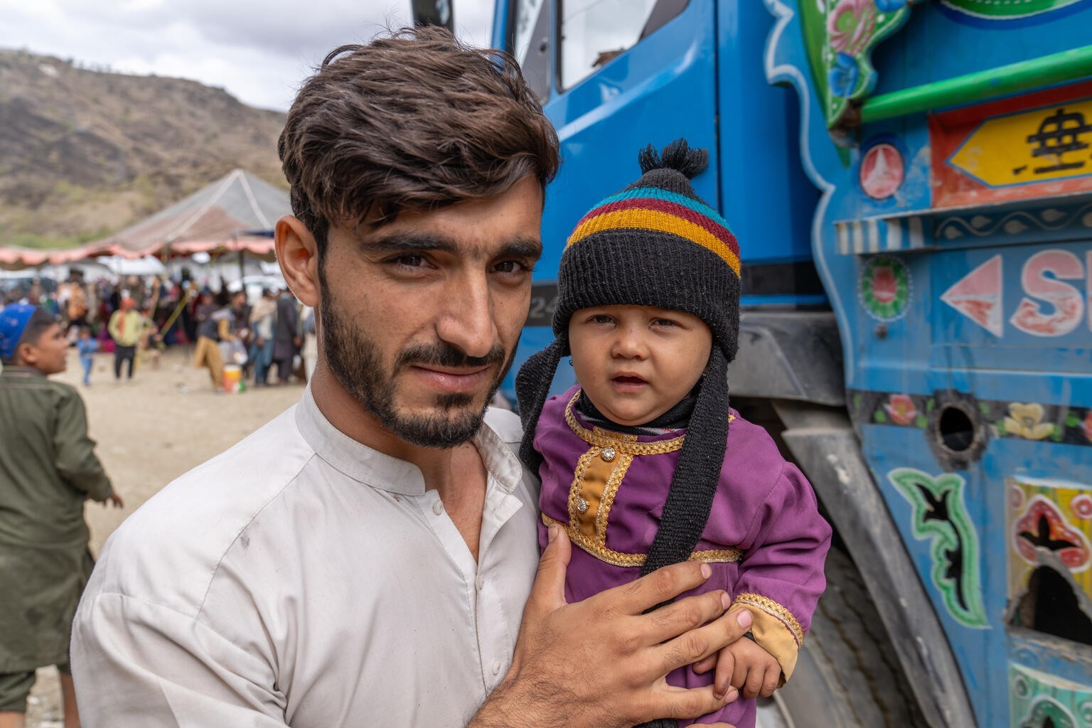 On 17 October 2023, a father poses with his baby at Afghanistan&#039;s Torkham border point with Pakistan in Nangarhar province.

Polio is still endemic in Afghanistan – one of the last two countries  ...