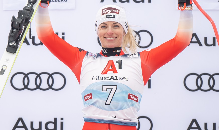 epa10406794 First placed Lara Gut Behrami of Switzerland celebrates on the podium after the women's Super G race at the FIS Alpine Skiing World Cup in St. Anton am Arlberg, Austria, 15 January 20 ...