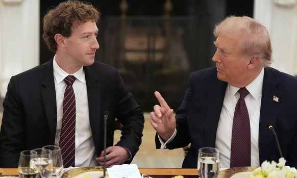 President Donald Trump speaks as Facebook CEO Mark Zuckerberg listens during a dinner in the State Dinning Room of the White House, Thursday, Sept. 4, 2025, in Washington. (AP Photo/Alex Brandon)
Trum ...