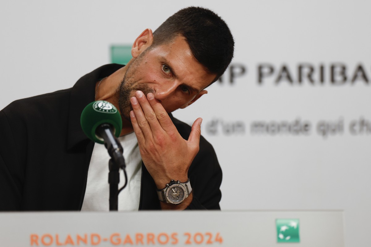 Serbia's Novak Djokovic ponders a question during a press conference ahead his first round match of the French Open tennis tournament at the Roland Garros stadium in Paris, Sunday, May 26, 2024.  ...