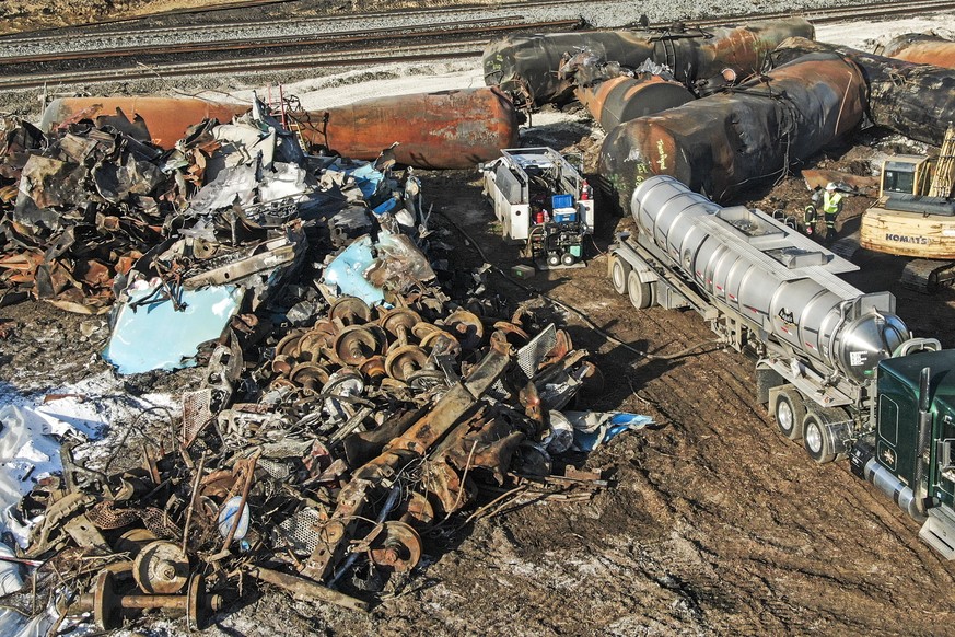 epa10476198 An aerial photo made with a drone shows railroad car wheels sitting among debris as cleanup continues in the aftermath of a Norfolk Southern freight train derailment that has created conce ...