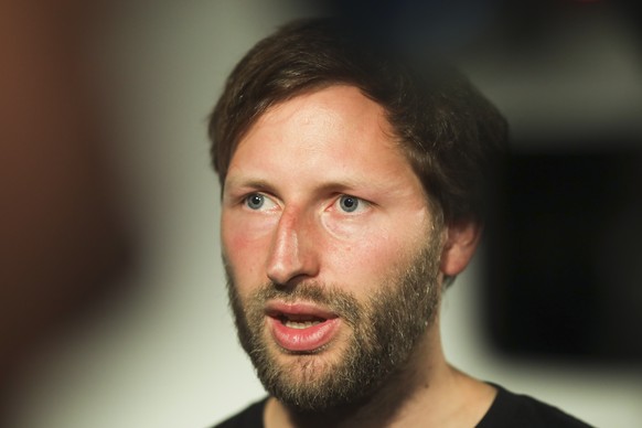 Ruben Neugebauer spokesman of German humanitarian group Sea-Watch talks to journalists after a news conference in Berlin, Germany, Tuesday, July 2, 2019. Sea-Watch says Carola Rackete, captain of its  ...