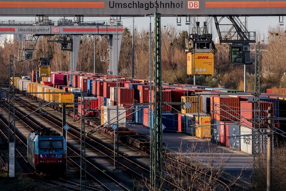 epa12878635 Containers are stacked at a transshipment terminal near Berlin, Germany, 09 April 2026. The European Parliament on 26 March 2026 voted for an EU-US trade deal, which is to include tariffs  ...