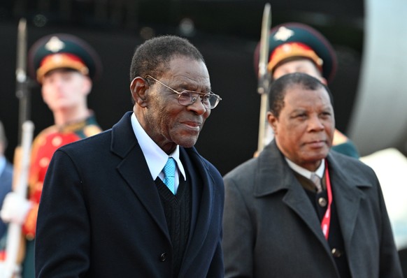 epa12081604 A handout photo made available by the photo host agency RIA Novosti shows President of the Republic of Equatorial Guinea Teodoro Obiang Nguema Mbasogo disembarks from a plane as he arrives ...