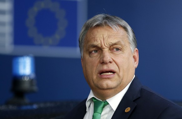 Hungarian Prime Minister Viktor Orban arrives for an EU summit at the Europa building in Brussels on Thursday, Dec. 14, 2017. European Union leaders are gathering in Brussels and are set to move Brexi ...